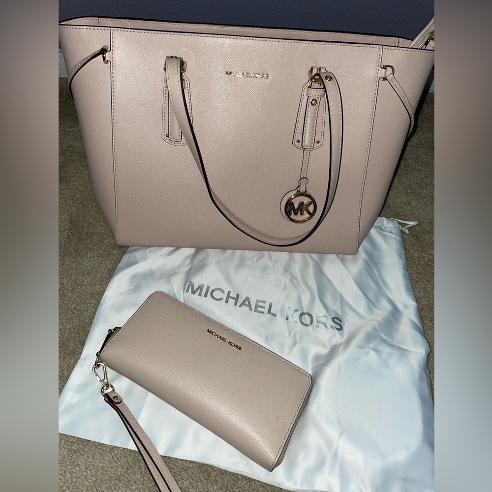 Authentic Michael Kors handbag with wallet.